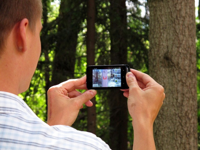 The Relasphone app in use in the forest.